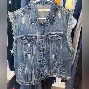 Distressed denim vest